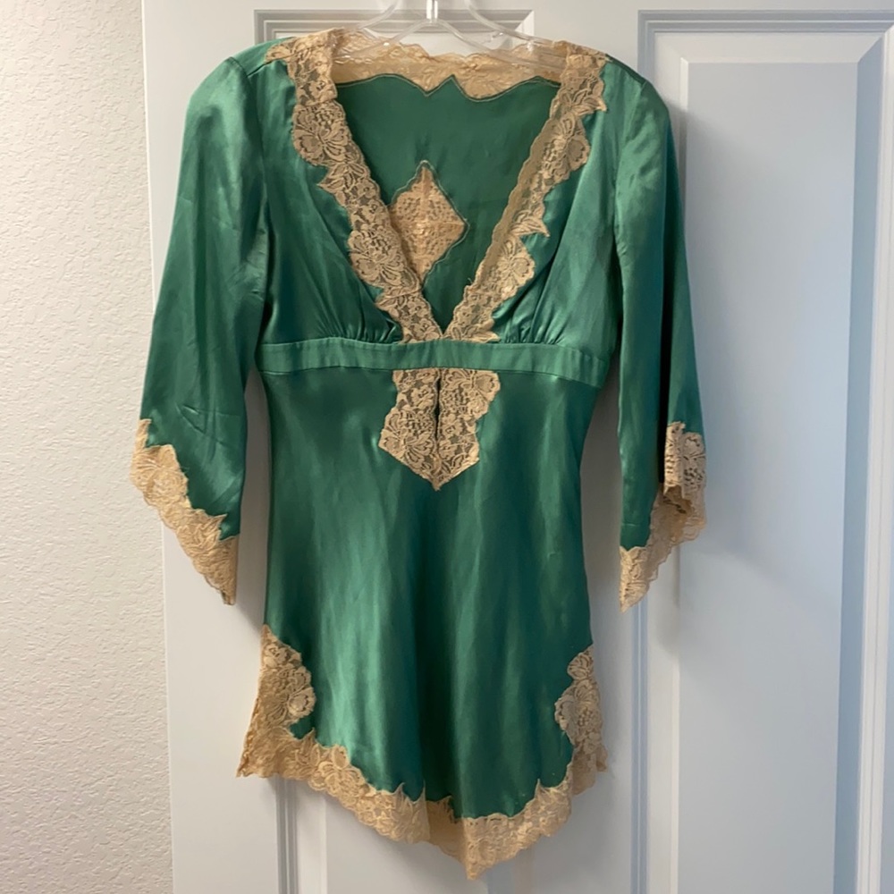 Silk green top.